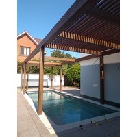 Пергола во дворе частного дома над бассейном из соснового клееного бруса и лиственницы. г. Краснодар